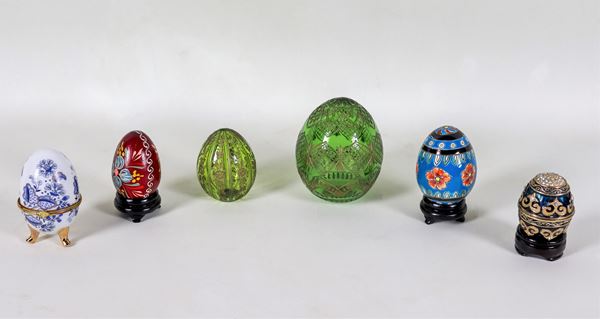 Lot of six crystal, glass, porcelain and enamel eggs