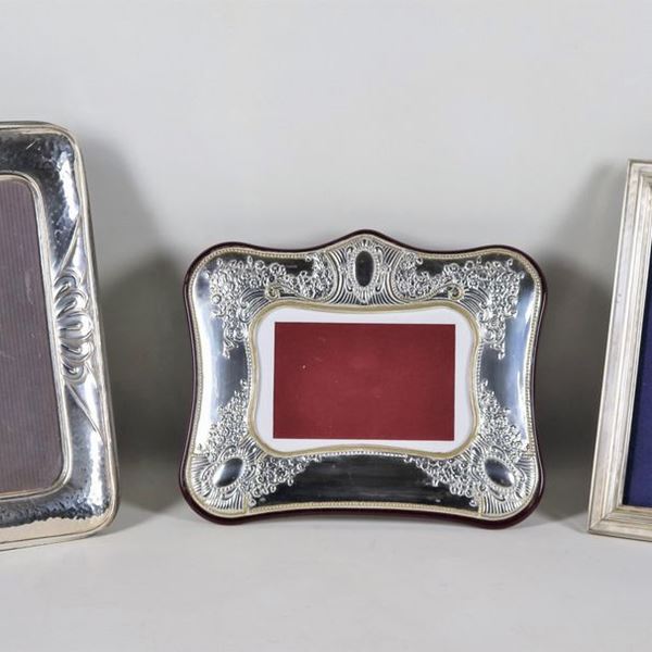 Lot of three chiselled and embossed silver picture frames