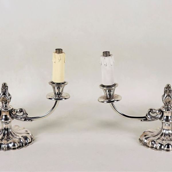 Pair of chiselled and embossed silver double-doubles, electric light reduction with two lights each, gr. about 800