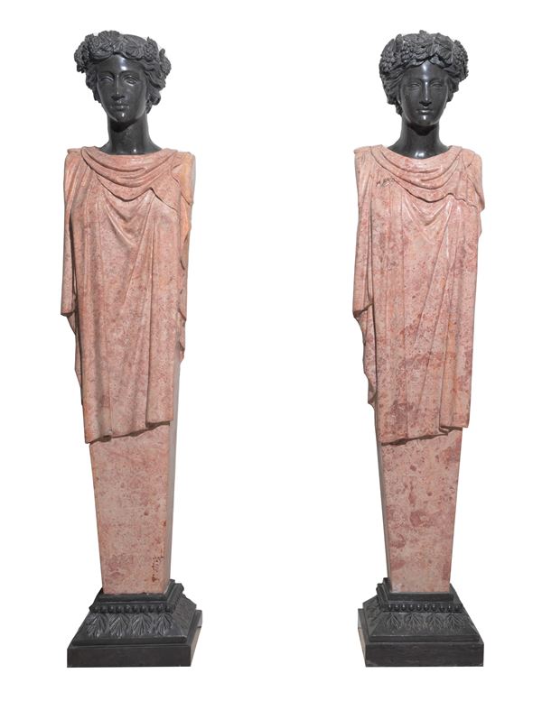 Pair of "Bacchus" herms in black Belgian and pink Egyptian marble, 35 x 25 x 175 h cm, base 34 x 30 cm. Weight approx. 300 kg. each