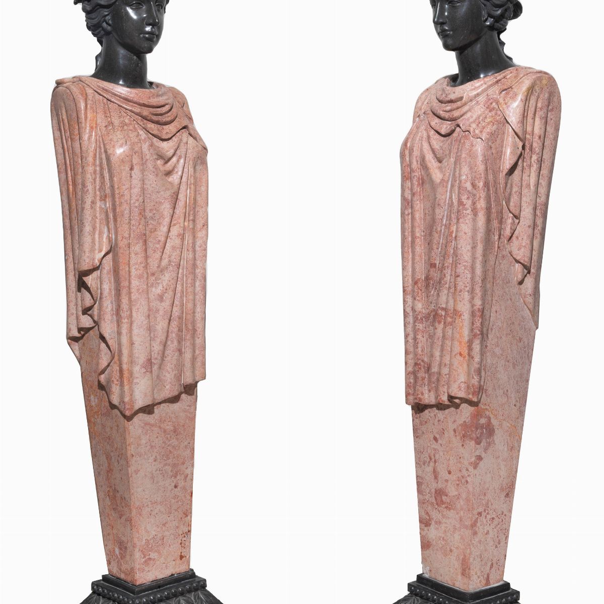 Coppia di erme "Bacco" in marmo nero del Belgio e rosa egiziano, cm 35 x 25 x 175 h, la base cm 3...