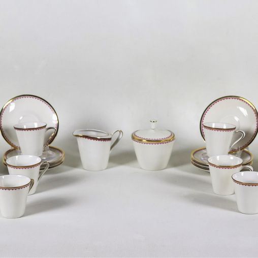 Lot of a sugar bowl, a milk jug and twelve coffee cups with saucers in German Bavarian porcelain, edges in pure gold (14 pcs)