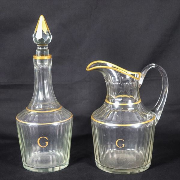 Carved crystal wine jug and bottle with gilt trim and monogram