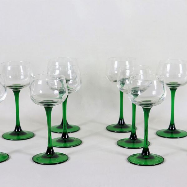 Lot of twelve French crystal goblet glasses with green stem