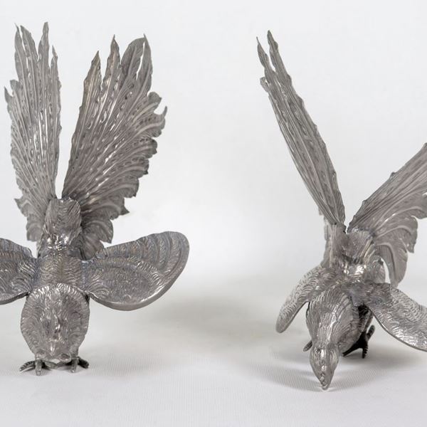 Pair of "Roosters" in silver-plated, embossed and chiseled metal