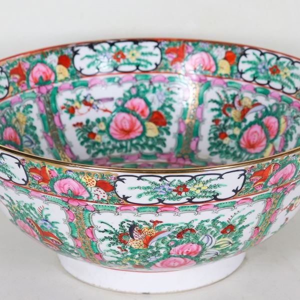 Large Canton porcelain bowl, entirely decorated with relief enamels with motifs of oriental flowers