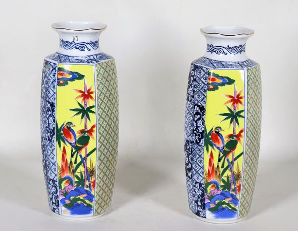 Pair of Chinese hexagonal porcelain vases, with relief enamel decorations with motifs of flowers and birds