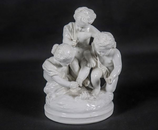 "Children's game", ancient small group in white Capodimonte porcelain, small lack