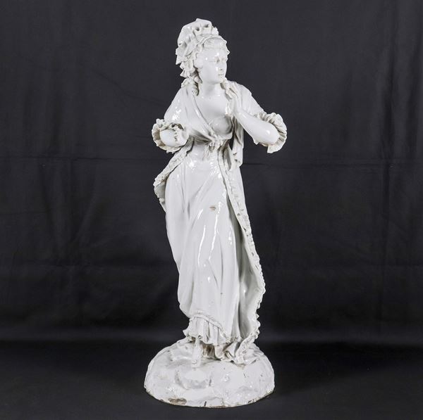 "Young lady with cap", ancient large sculpture in white Capodimonte porcelain. Slight defects and lack of a finger on one hand