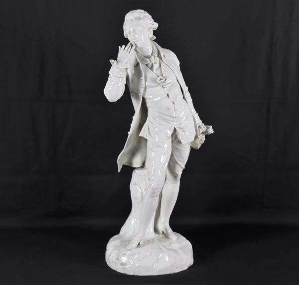 "Knight", antique large white porcelain sculpture from Louisbourg. A finger is missing from the right hand and the edge of the jacket is broken