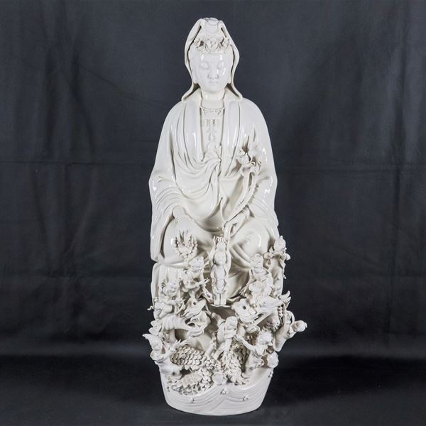 "Guanyin with allegory of small Buddhas", large Chinese sculpture in white porcelain, some minor flaws