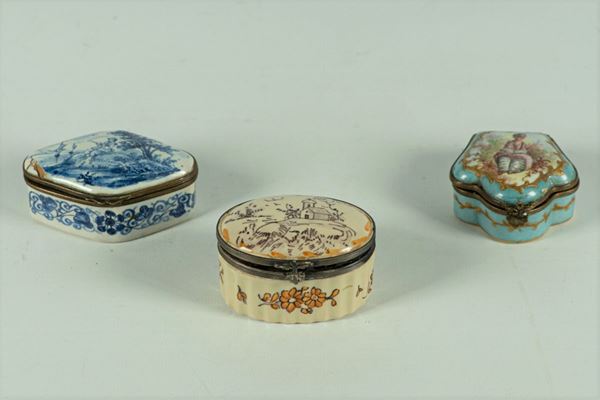 Three Snuffboxes in porcelain and enamel