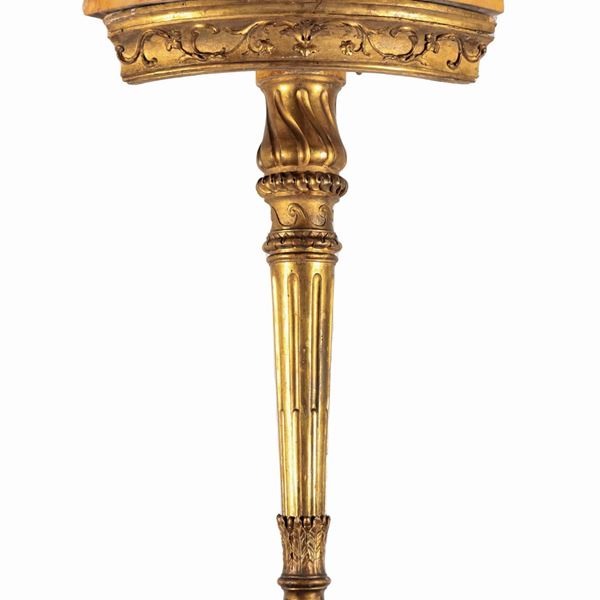 Antique small corner console in gilded wood and carved with Louis XVI motifs, one central leg and top in yellow marble