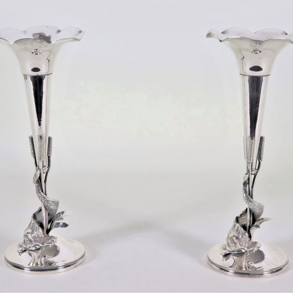 Pair of rose vases in silvered metal, embossed and chiseled with sculptures of dolphins