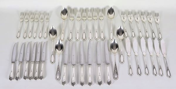 Cutlery set in chiselled and embossed silver with Louis XVI motifs with engraved monogram (42 pcs), gr. 1700