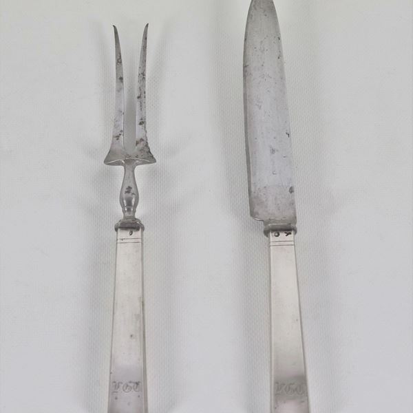 Pair of antique cutlery for roast with silver handles