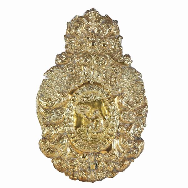 Antique Louis XV gilded copper plaque, entirely chiseled and embossed in relief with "Putto with fruit basket" in the center. Missing two candlesticks