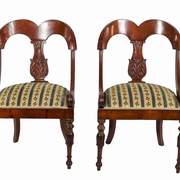 Pair of antique Tuscan chairs from the Impero line, in mahogany and mahogany feather with carved backs