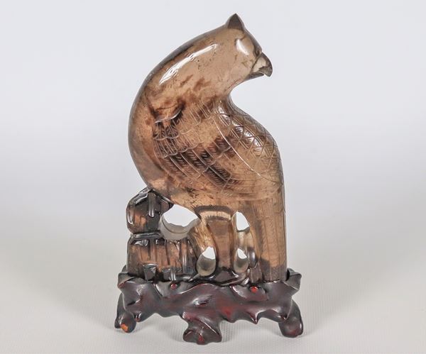 "Parrot", Chinese figurine in hard amber stone, teak base