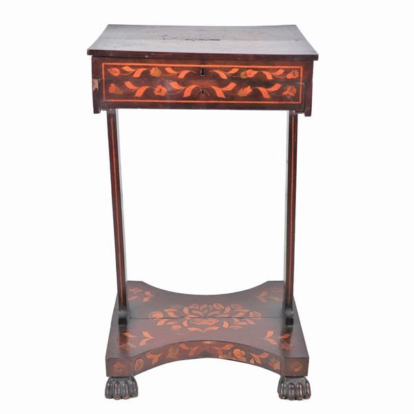 Antique Dutch rectangular work table in mahogany, with inlays of floral weaves and amphora with flowers, opening top with compartments inside, a drawer underneath and two legs resting on a shaped shelf supported by four leonine feet