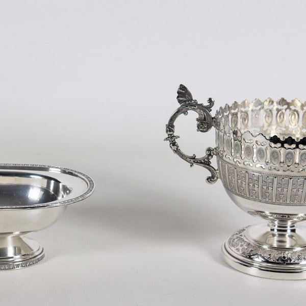 Lot of an oval silver tray marked Fornari gr. 128 and a silvered and chiseled metal cup marked W.M.F.