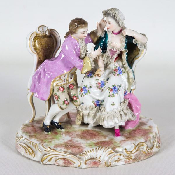 "The courtship", an ancient group in polychrome porcelain