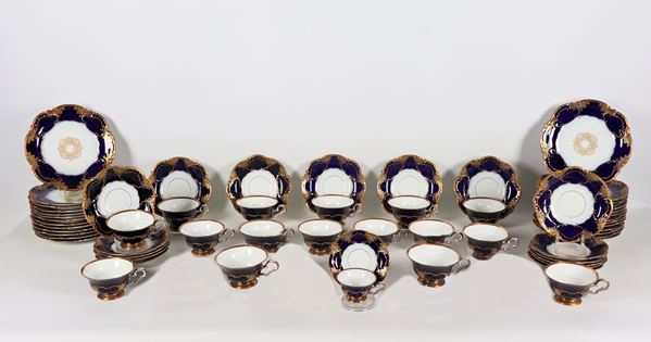 Cobalt blue and pure gold German porcelain lot of 16 tea cups with saucers, 1 coffee cup with saucer and 27 dessert plates (44 pcs)