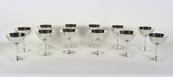 Lot of twelve ice cream bowls in silver metal, traces of vermeil inside