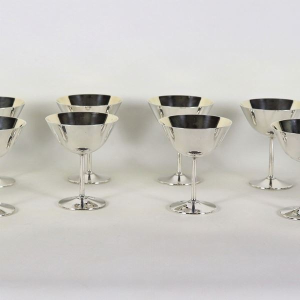 Lot of twelve ice cream bowls in silver metal, traces of vermeil inside