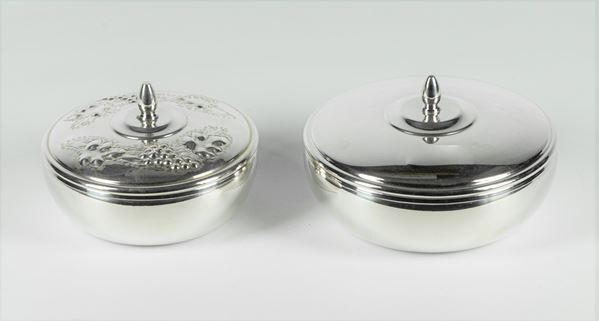Two round silver boxes