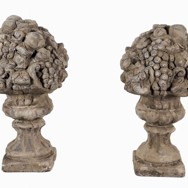 Pair of small amphorae with carved stone fruit allegories