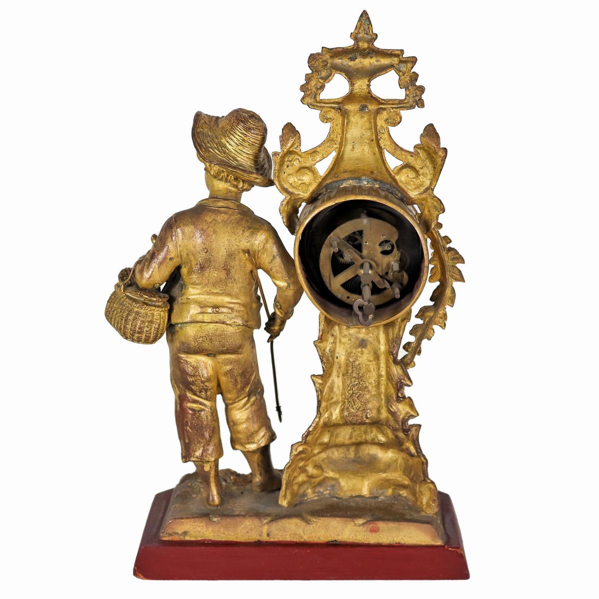 Piccolo orologio da tavolo francese in metallo dorato, sbalzato e cesellato con scultura di "Pesc...