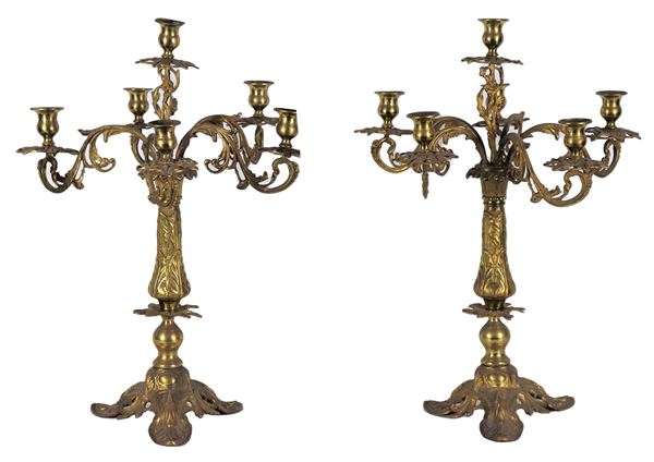 Pair of antique French candlesticks in gilded bronze, embossed and chiseled with foliage motifs, 6 flames each
