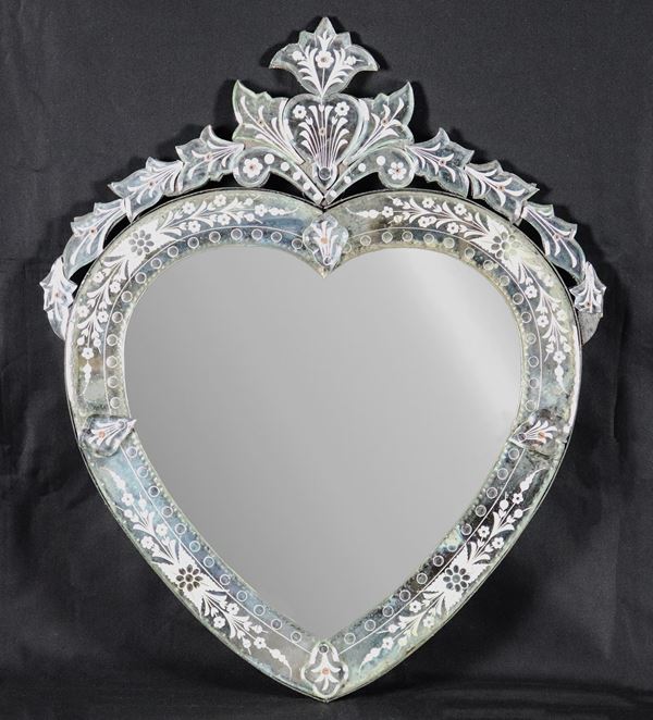 Heart-shaped mirror in Murano glass, entirely engraved with floral motifs