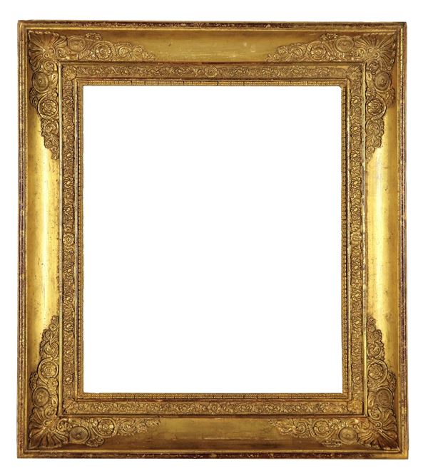 Ancient Tuscan Empire frame, known as a box, in gilded wood and carved with neoclassical motifs
