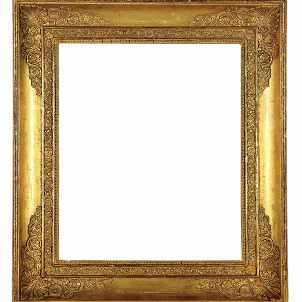 Ancient Tuscan Empire frame, known as a box, in gilded wood and carved with neoclassical motifs