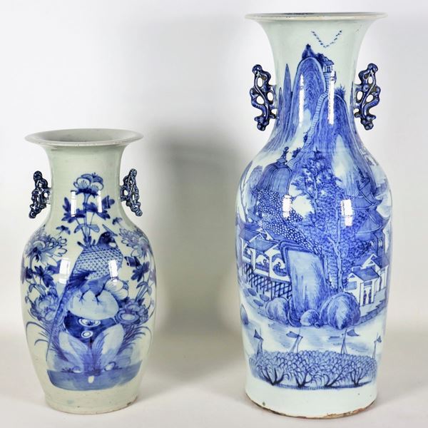 Lot of two Chinese blue porcelain vases, one with an "Oriental Landscape" motif and one with a flower, leaf and exotic bird motif.