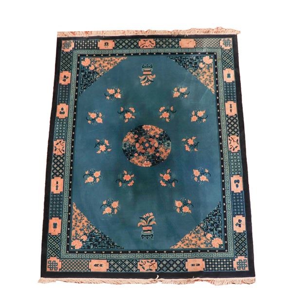 Chinese Beijing carpet with a naturalistic floral design on a light blue, havana and pink background, M 3.55 X 2.53