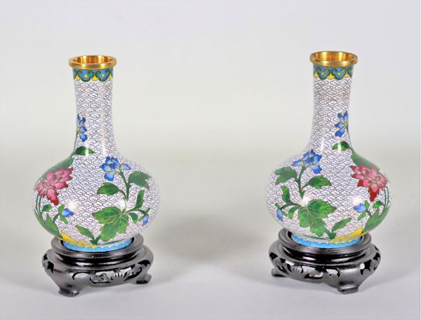 Pair of Chinese cloisonné enamel vases with flower and leaf decorations