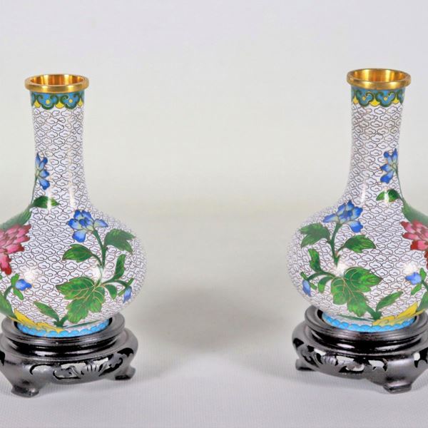 Pair of Chinese cloisonné enamel vases with flower and leaf decorations