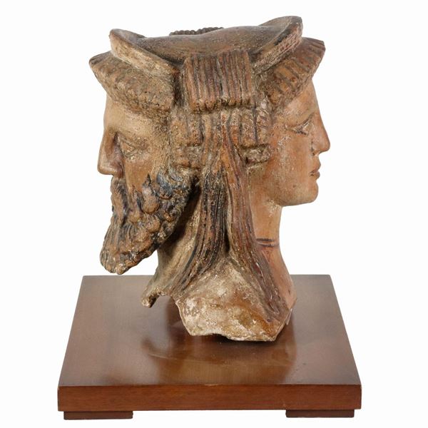 "Giano bifronte", scultura in terracotta patinata, sorretta da base in legno patinato