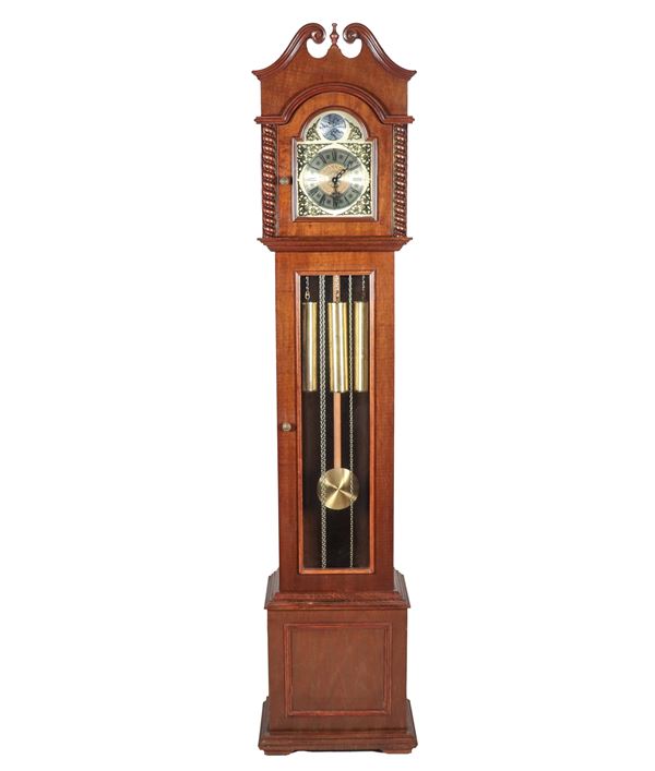Mahogany tower clock with worked dial and bell chime. Not working, to be serviced.
