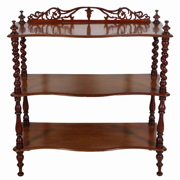 Three-storey walnut etagere with turned columns uprights, small carved cymatium on the top