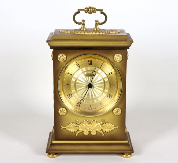 Cappuccina in gilded and chiseled bronze with Empire motifs, dial signed Le Castel-Swiss