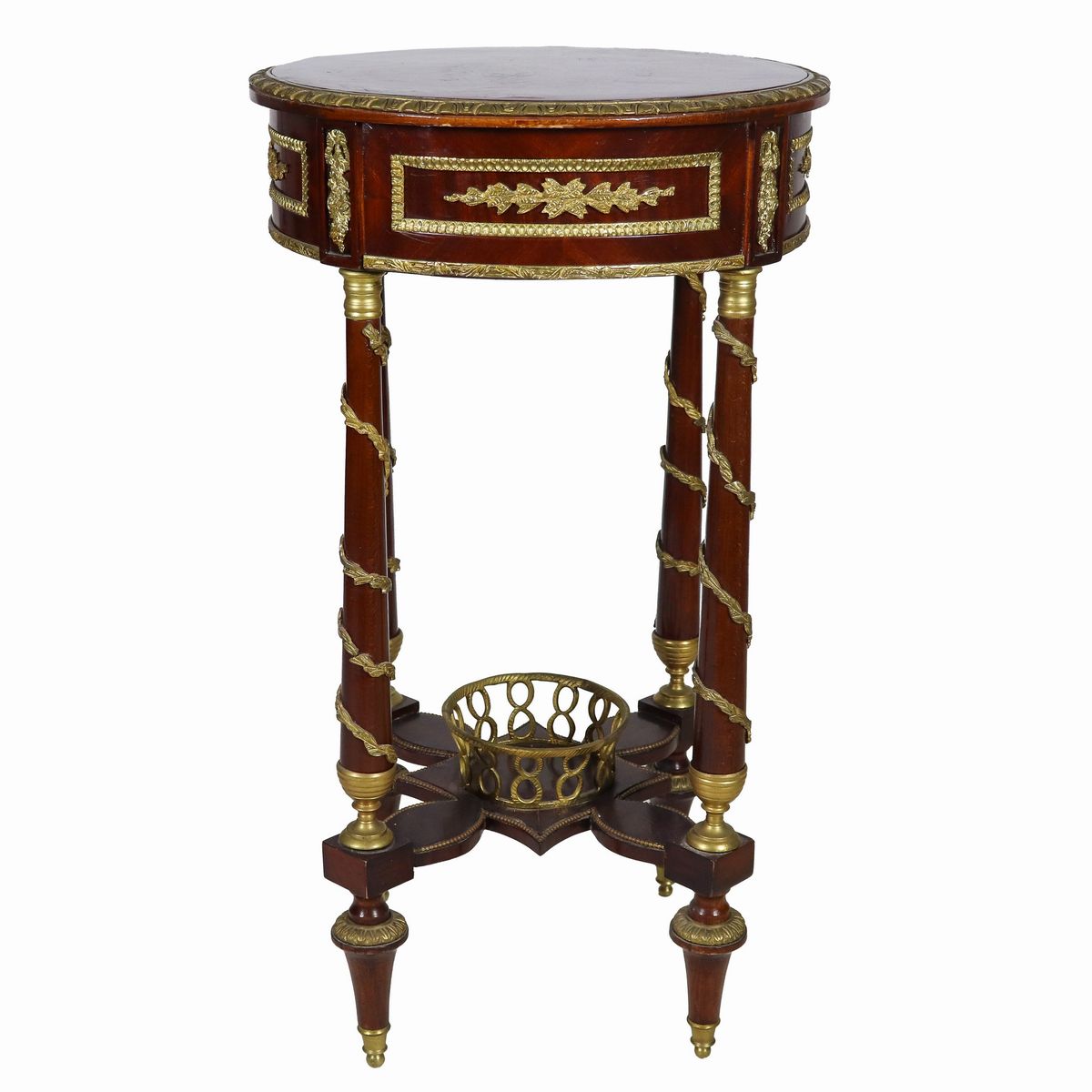 Tavolo francese da centro a forma tonda di linea Impero, in ebano viola e mogano, con guarnizioni...