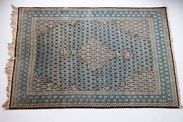 Persian carpet with geometric motifs
