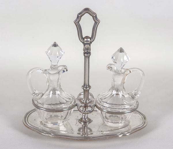 Oliera in argento cesellato e sbalzato con due ampolle in cristallo, gr. 360