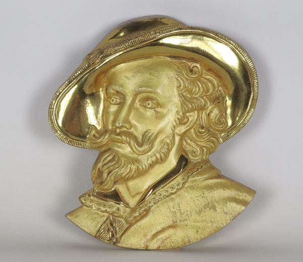 "Face of Garibaldino", gilded bronze plaque, embossed and chiselled