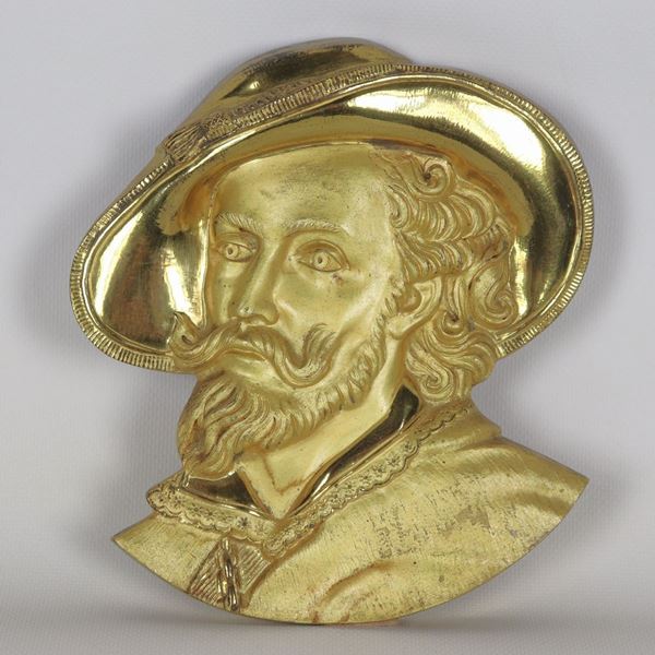 "Face of Garibaldino", gilded bronze plaque, embossed and chiselled