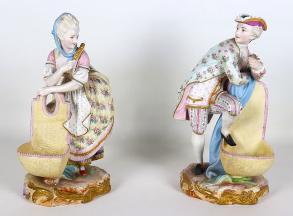 "Lady and knight", pair of small French sculptures in decorated and polychrome biscuit